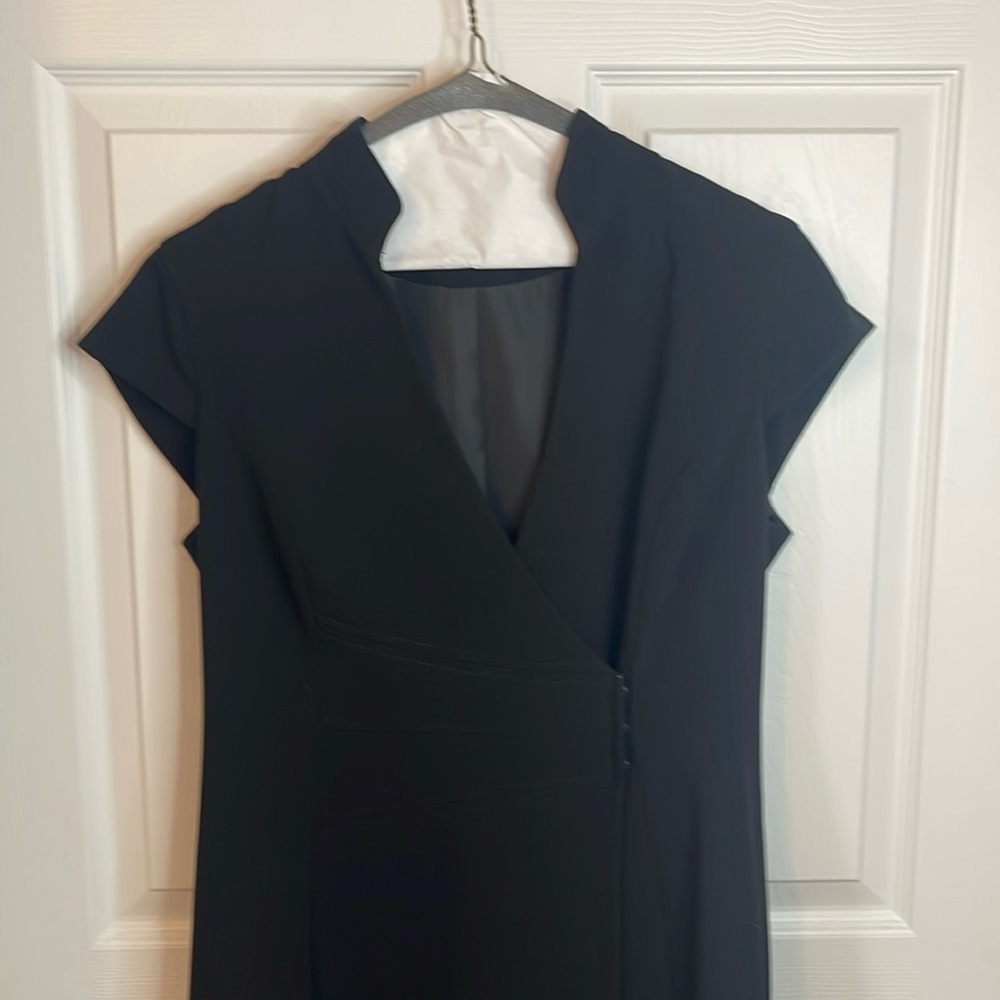 Size 8 black cocktail dress, excellent condition.